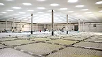 Inside: Twelve slender columns support the roof structure; The geothermal HVAC system includes in-floor heating.