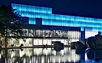 Lighting designer Ion Luh used a combination of warm, dimmable fluorescent and halogen lamps in the visible public areas to balance with the LED media wall and inner halogen-lit galleries.