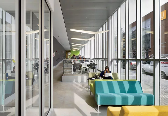 The student lounge features birdlike Artemide Mouette fixtures.