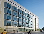 The labs at the Energy Biosciences Building are housed in a bar-shaped wing that has generously sized north-facing windows and a rainscreen skin made of glass-fiber-reinforced concrete panels.