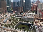 The memorial plaza occupies nearly half of the 16-acre site with a pair of voids identifying the footprints of the destroyed skyscrapers.