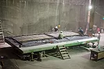To fabricate the precast cladding, contractors set up a shop in an already enclosed lower-level gallery. They used steel-topped tables as the formwork base and reconfigurable dams to define the panels