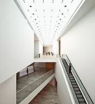 Visitors entering from the museum’s main building take a long escalator to the Israeli Promenade, a skylit space leading to galleries displaying 20th-century and contemporary Israeli artworks.