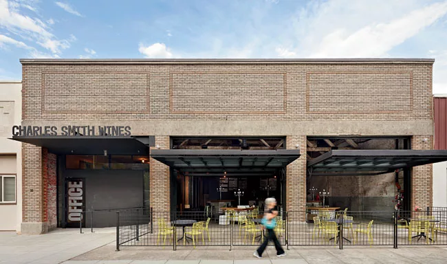 <strong>Street Scene</strong> Garage doors swing open and closed with a custom-designed system of cranks, gears, and chains. The gadget echoes devices that Kundig has created for other projects. Here,