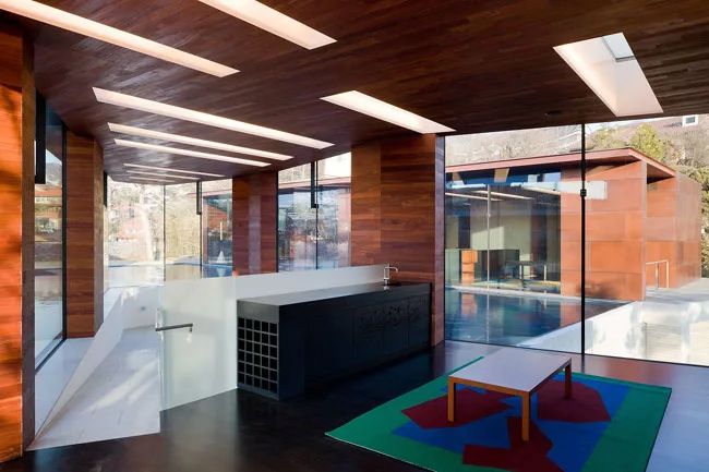 Rugs were designed by the architect.