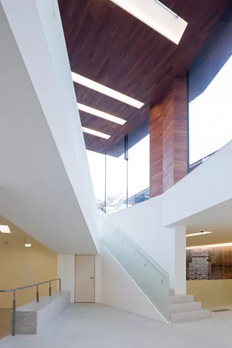 Stairs lead from the galleries on the lower level to the pavilions above. 
