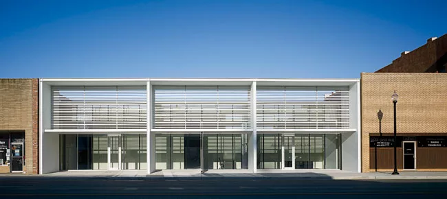 <strong>New Neighbor</strong> The building’s brise-soleil, a kind of scuptural installation on Main Street, provides shading as well as functioning as a front porch for the community.