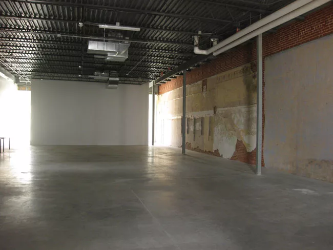 The south portion of the building has been left raw.
