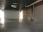 The south portion of the building has been left raw.