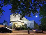 At the west end of the Barnes, the light canopy cantilevers over a terrace. A limestone rainscreen is attached to the steel-framed gallery building (at right) and a poured concrete pavilion wing (at l