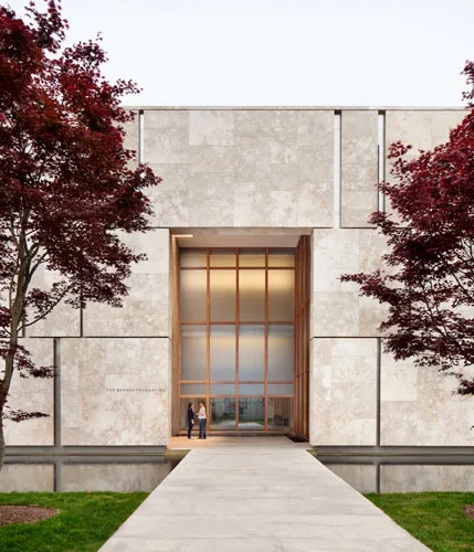 This entrance, on the north facade, leads into the L-shaped Pavilion wing that holds temporary exhibition rooms and ancillary spaces. (Green roofs and photovoltaic panels should help qualify the build