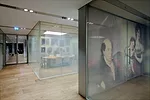 In a modern take on portraiture, large-scale depictions of members of the Rothschild family are printed onto silk scrims.