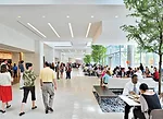 A five-story barlike volume to the west of the tower houses the Nebu caf&eacute; and a lively seating area that are open to both employees and visitors.
