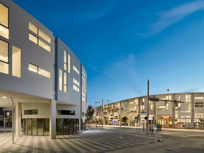 The first phase of Uptown was completed in August, comprising the Triangle, at left, and the Beach, at right. The two mixed-use structures sit across from each other on Euclid Avenue, providing studio