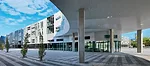 While the buildings line Euclid, they avoid uniformity with playful window patterns, ribbed aluminum facades that cast varying shadows, and plazas with landscape design by James Corner Field Operation