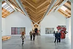 To manage rainwater and snow melt, the designers concealed primary and backup pipes in the X-braces that cross the building's central spine; the pipes deliver water to a belowground infiltration syste