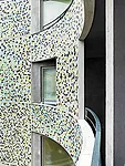 The architects were inspired by Antoni Gaud' more than by Finnish residential design; his integration of craft into his work is reflected in the facade's porcelain chips