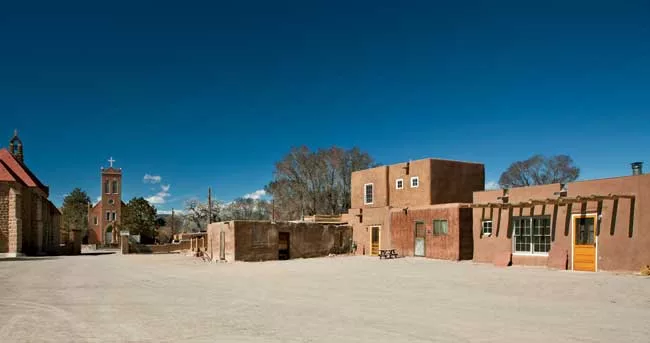 By the 1970s all of the dwellings in the historic center were one story. As part of the preservation project, the contractor is building upper stories, but not necessarily in locations where they exis