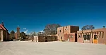 By the 1970s all of the dwellings in the historic center were one story. As part of the preservation project, the contractor is building upper stories, but not necessarily in locations where they exis