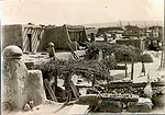 Two-story houses were common in Owe'neh Bupingeh through at least the early 20th century. 