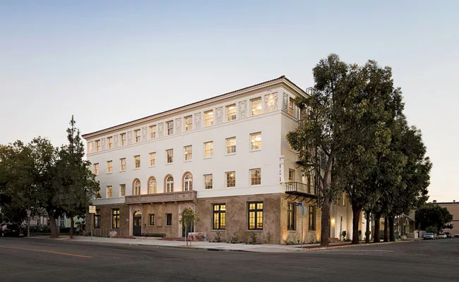 The architects drew on archival materials to re-create the facade’s original cast-concrete balcony.