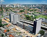 In a city as visually chaotic as S'o Paulo, Jardim Edite does not stick out, but its well-heeled site makes this social-housing development special.