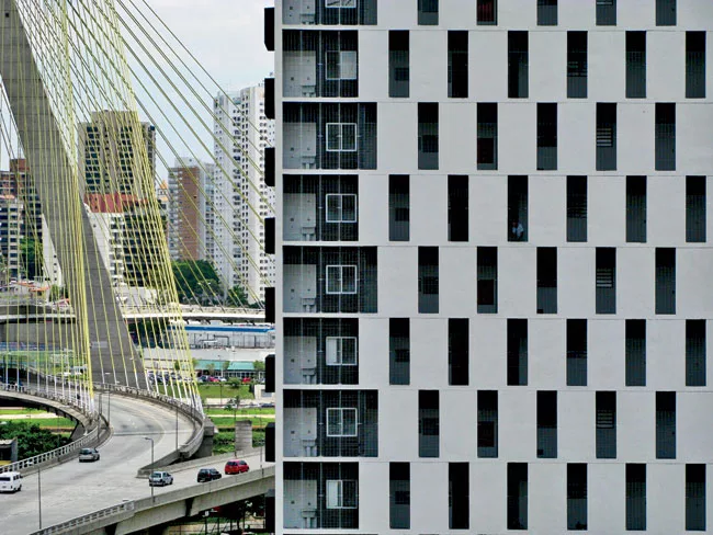 The towers' extra wide exterior halls are visible through vertical apertures.