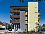 As the southern-end elevation of La Valentina Station shows, the long and narrow residential complex is girded with balconies.