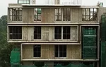 Stacked units under construction.
