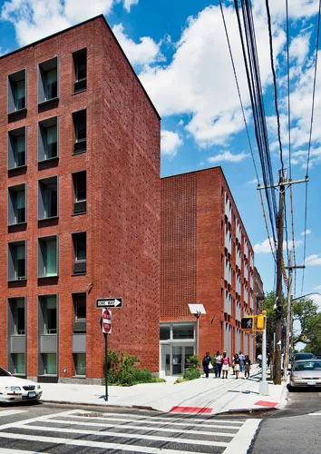 The lobby (cutaway perspective shown in slide #1) off Hegeman Avenue is glazed for ample views and light, but set into thick load-bearing walls faced with molded brick.