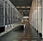 The lower building serves as the Design Hub's archives and has spaces for books, lectures, and exhibitions.