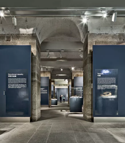 Magazine A (1868), with granite walls and brick barrel-vaulted ceilings, is now an art gallery. Its thick walls help keep indoor temperature and humidity in check.
