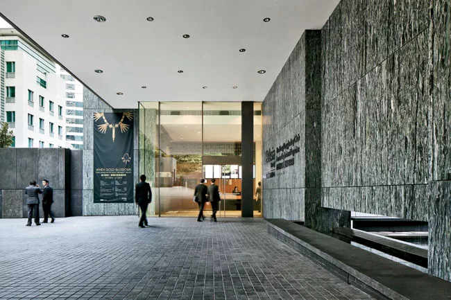 Stairs lead to the GG Block, built in the 1940s for the Royal Military Police and now used for offices. Next to it is the new pavilion, designed for visitor orientation, events, and dining.