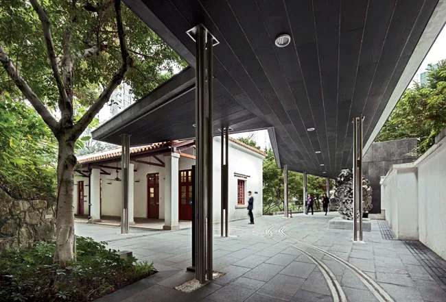 The architects also glazed and covered the veranda of this masonry structure.