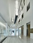 Daylight helps animate the elevator lobby.