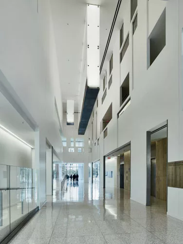 Daylight helps animate the elevator lobby.