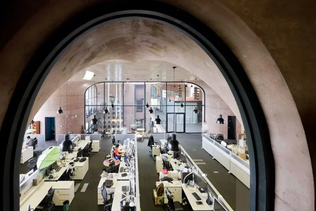 The five-story building provides the kind of open, nonhierarchical  workspace that the client needs.