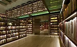 The stainless steel'lined connection between the library's two bays reveals the thickness of the original stone walls.