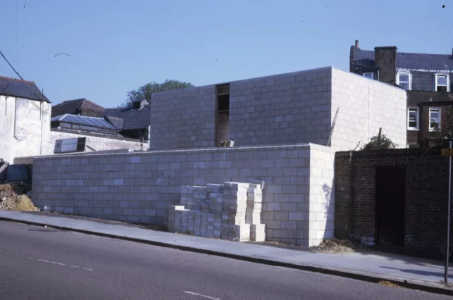The building under construction in the 1960s
