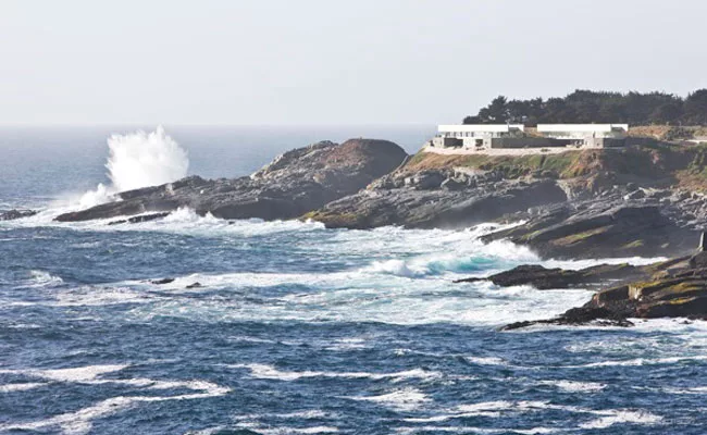 The two concrete bridge houses, one for the architect, the other for a friend, overlook the Pacific.