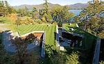 Gluck and his architect-led design-build team created the 10,600-square-foot submerged family house and the 11,100-square-foot recreation building by excavating 14,000 cubic feet of rock from the site