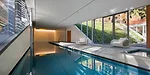 The recreation building features an interior lap pool, steam room, staff lounge, open living area, an interior courtyard, and an art gallery that connects the various spaces up to a second floor glass