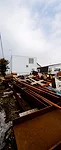 An industrial yard offers undesirable views on the house's south side.
