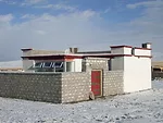 Tibetan herders need safe homes for their winters. Given the severe climate and the fact that lengthy transport routes fall within an earthquake zone, Hsieh introduced lightweight steel frames to trad