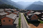 Hsieh designed this housing in response to the August 2009 Typhoon Morakot in Taiwan. 132 units of these steel-frame, fir- and steel-clad houses were completed in 2010 in Majia.