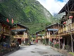 Each dwelling houses an average of six people. External staircases connect porches and free up interior space. 