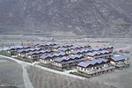 Autodesk, the Chinese Red Cross, the Narada Foundation (based in China), and Atelier-3 donated steel and construction money for the new homes, seen here from above.