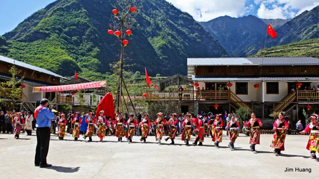 Villagers held a celebratory ceremony when the new housing was completed in September 2009.