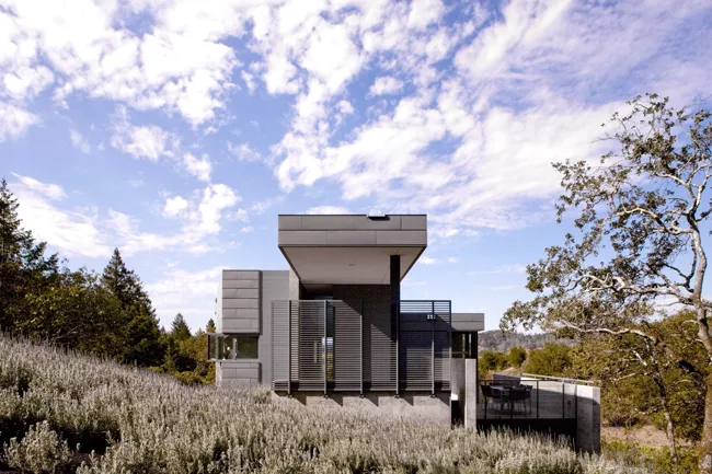 The concrete wall that divides public and private spaces was a very complicated pour because of precise window and door openings''a real feat,' says Chris Cooper.