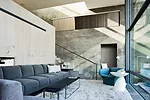 The concrete wall that divides public and private spaces was a very complicated pour because of precise window and door openings''a real feat,' says Chris Cooper.